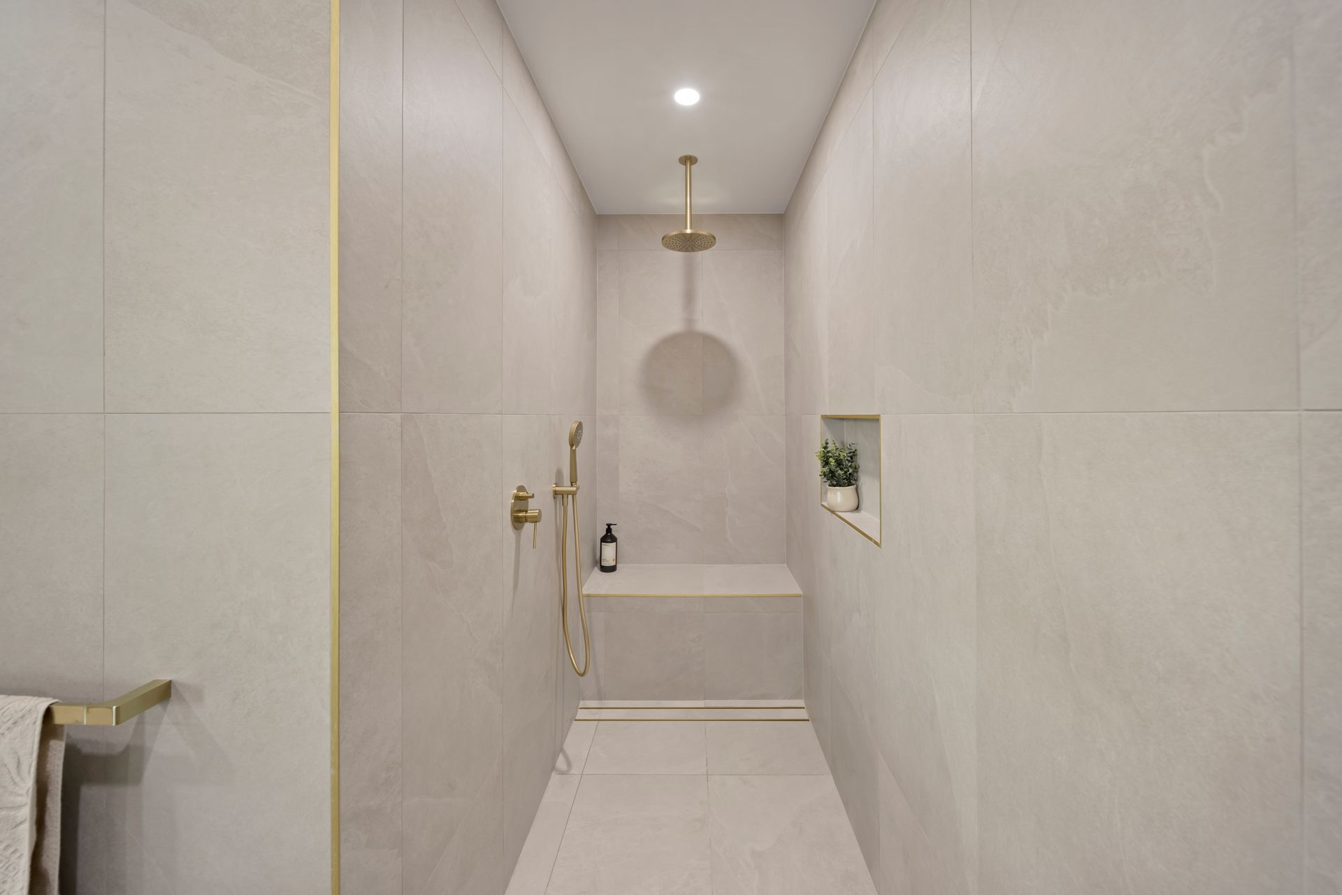 Narrow White Hallway With Brass Fixtures — Simon Bell Constructions in Alice River, QLD
