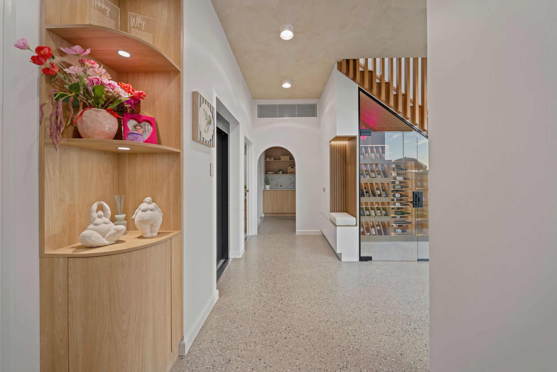Bright Hallway With Built-in Shelves, Flowers — Simon Bell Constructions in Alice River, QLD