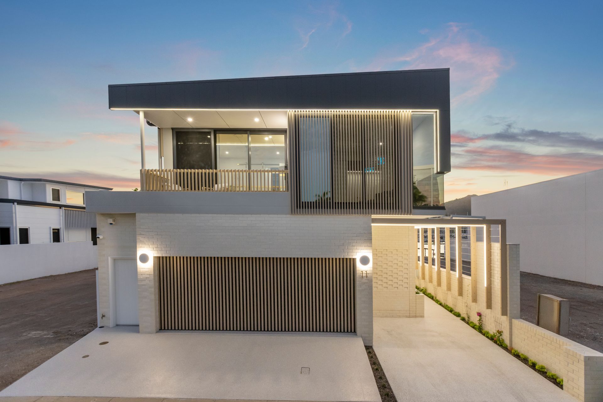 Modern Two-story White House With Balcony — Simon Bell Constructions in Alice River, QLD