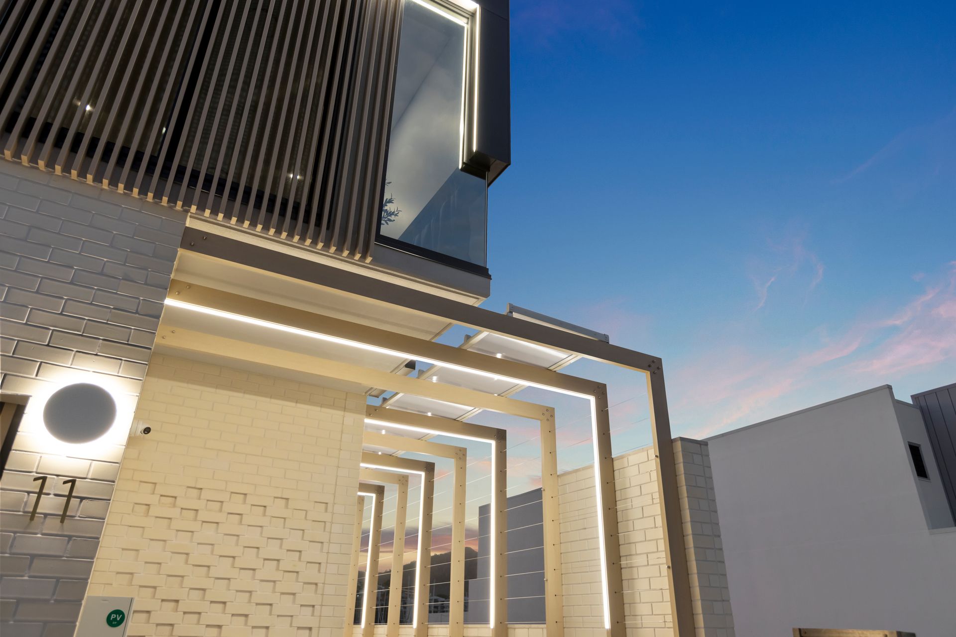 Modern Building Exterior With White Brick Walls — Simon Bell Constructions in Alice River, QLD