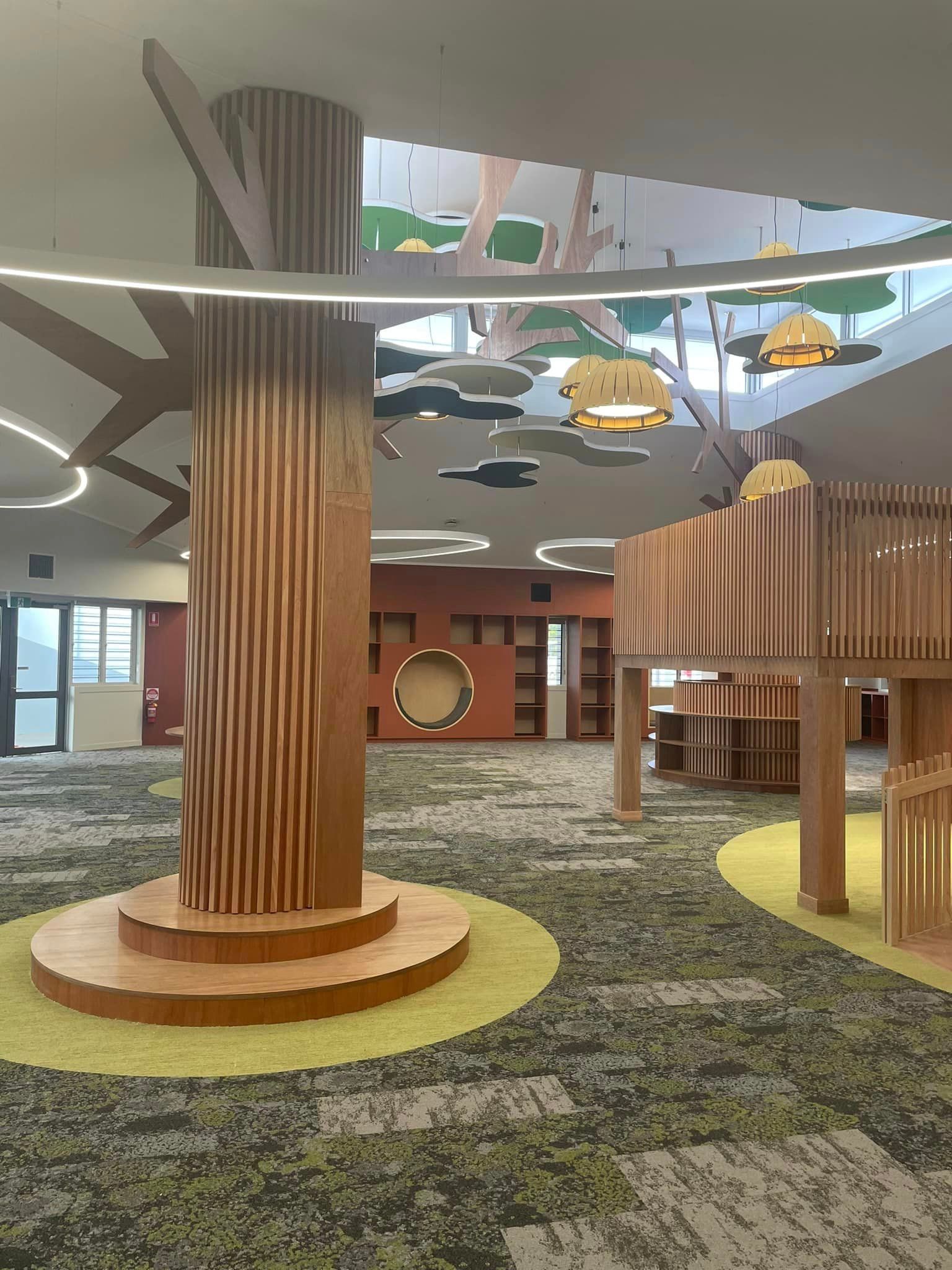 Playroom With A Large Faux Tree, Wooden Structures, And Colorful Carpet — Simon Bell Constructions in Alice River, QLD