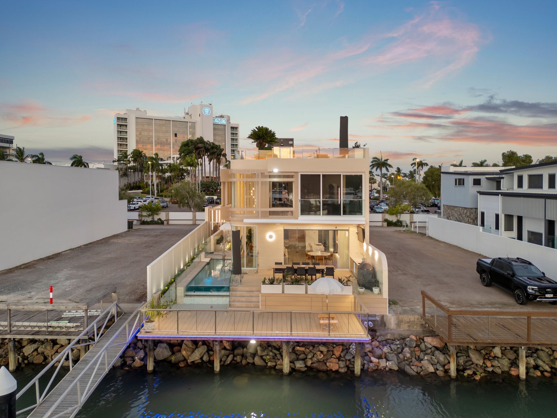 Modern Waterfront House With Pool — Simon Bell Constructions in Alice River, QLD