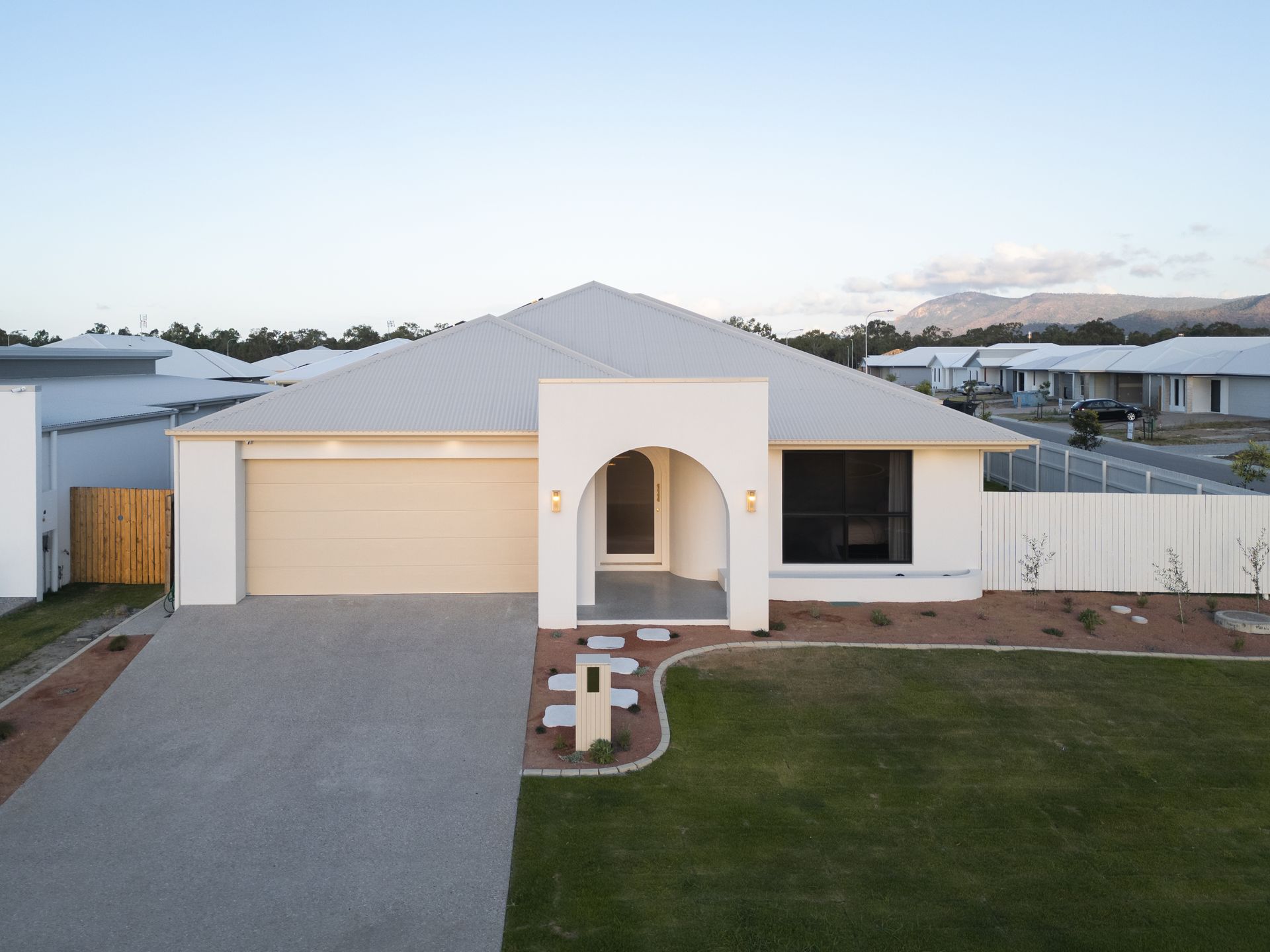 Modern White Single-Story House — Simon Bell Constructions in Alice River, QLD
