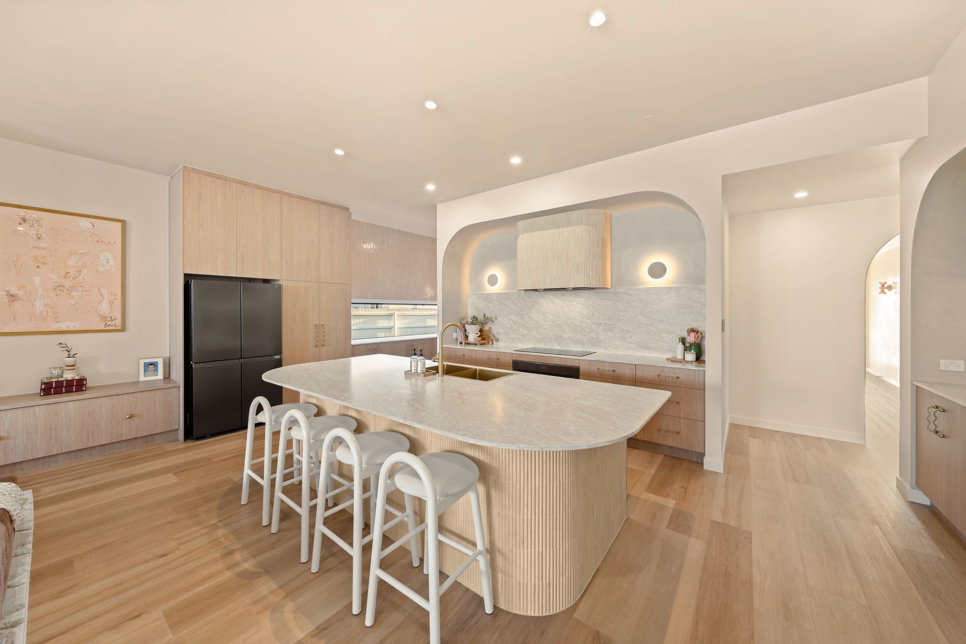 Modern Kitchen With Wood Island, White Bar Stools — Simon Bell Constructions in Alice River, QLD