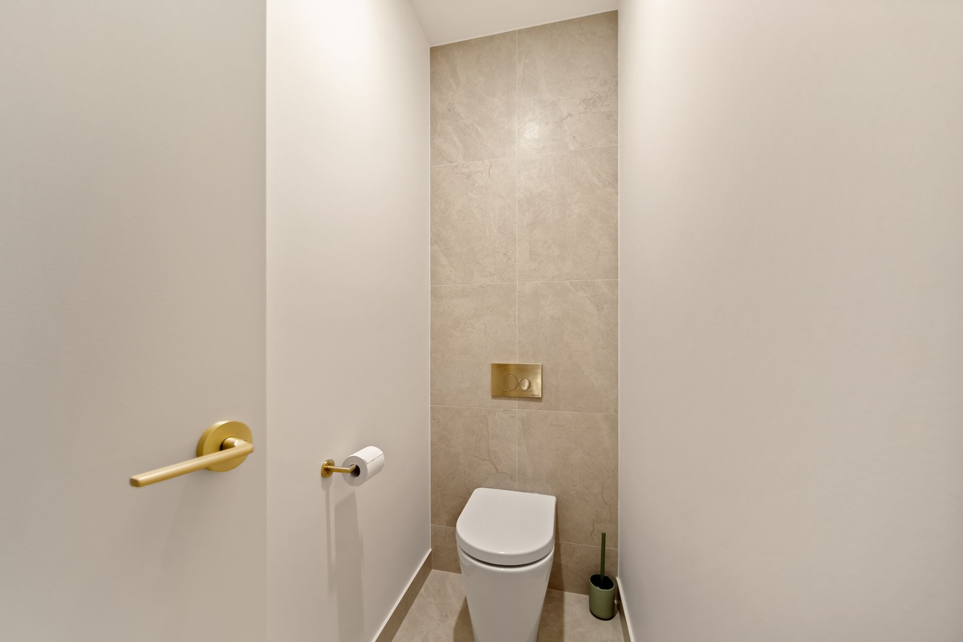 Small Modern Bathroom With a Toilet, Beige Tile Wall — Simon Bell Constructions in Alice River, QLD