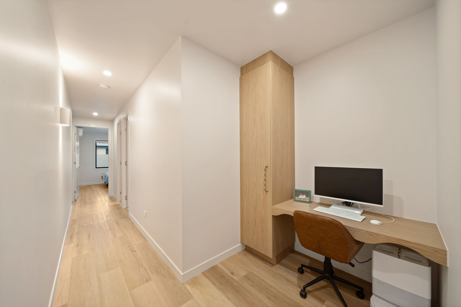 Bright Hallway With a Small Desk — Simon Bell Constructions in Alice River, QLD