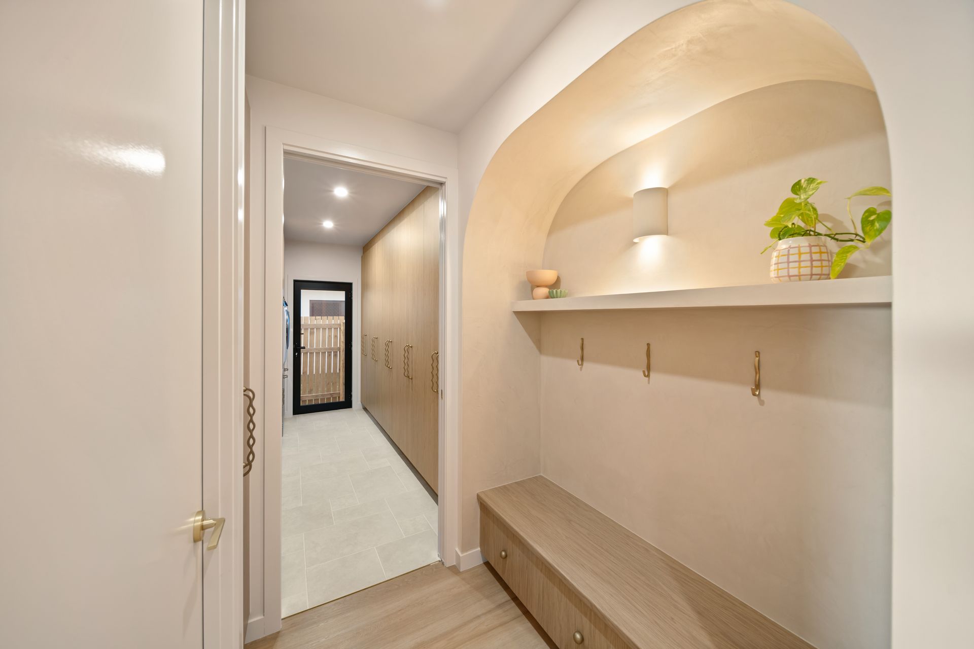 Bright Hallway With Arched Alcove, Built-in Bench — Simon Bell Constructions in Alice River, QLD