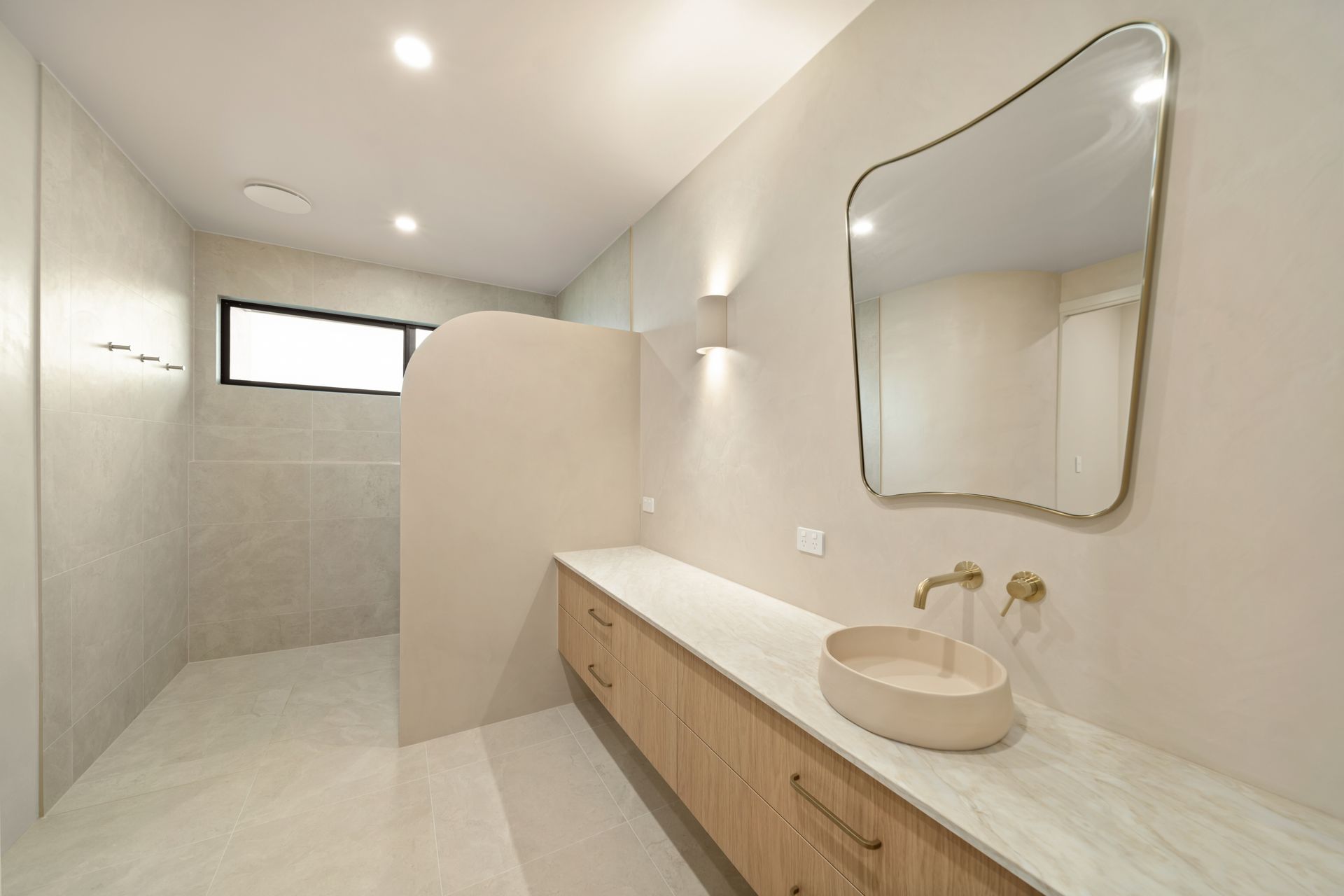 Modern Bathroom With Long Vanity, Round Sink, Mirror — Simon Bell Constructions in Alice River, QLD