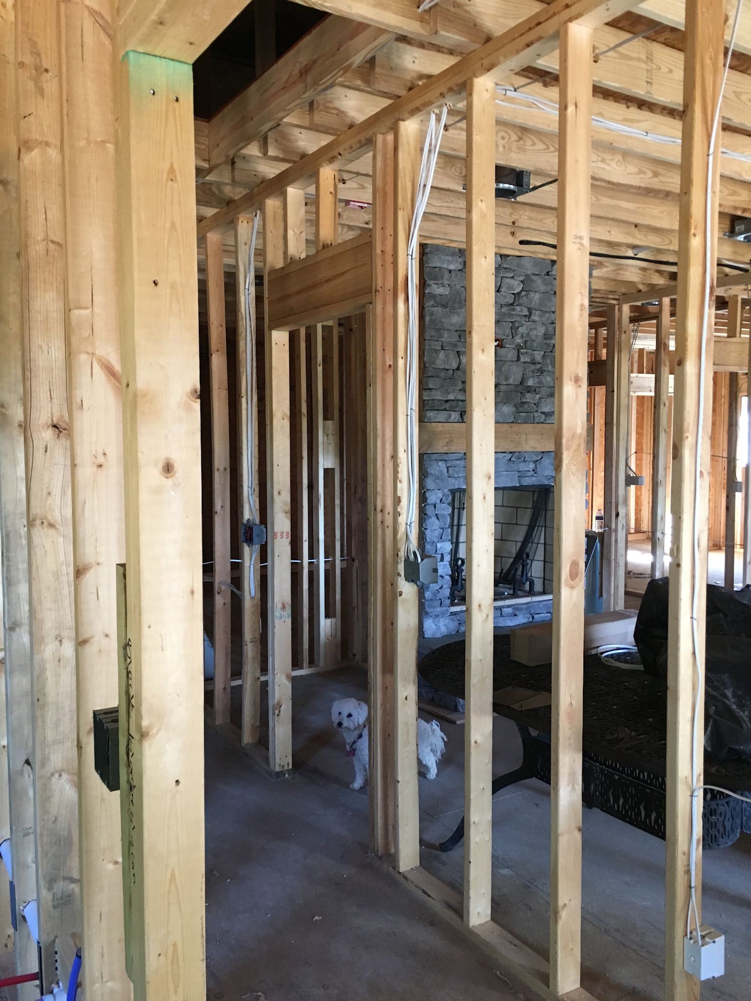 the inside of a house under construction with a fireplace
