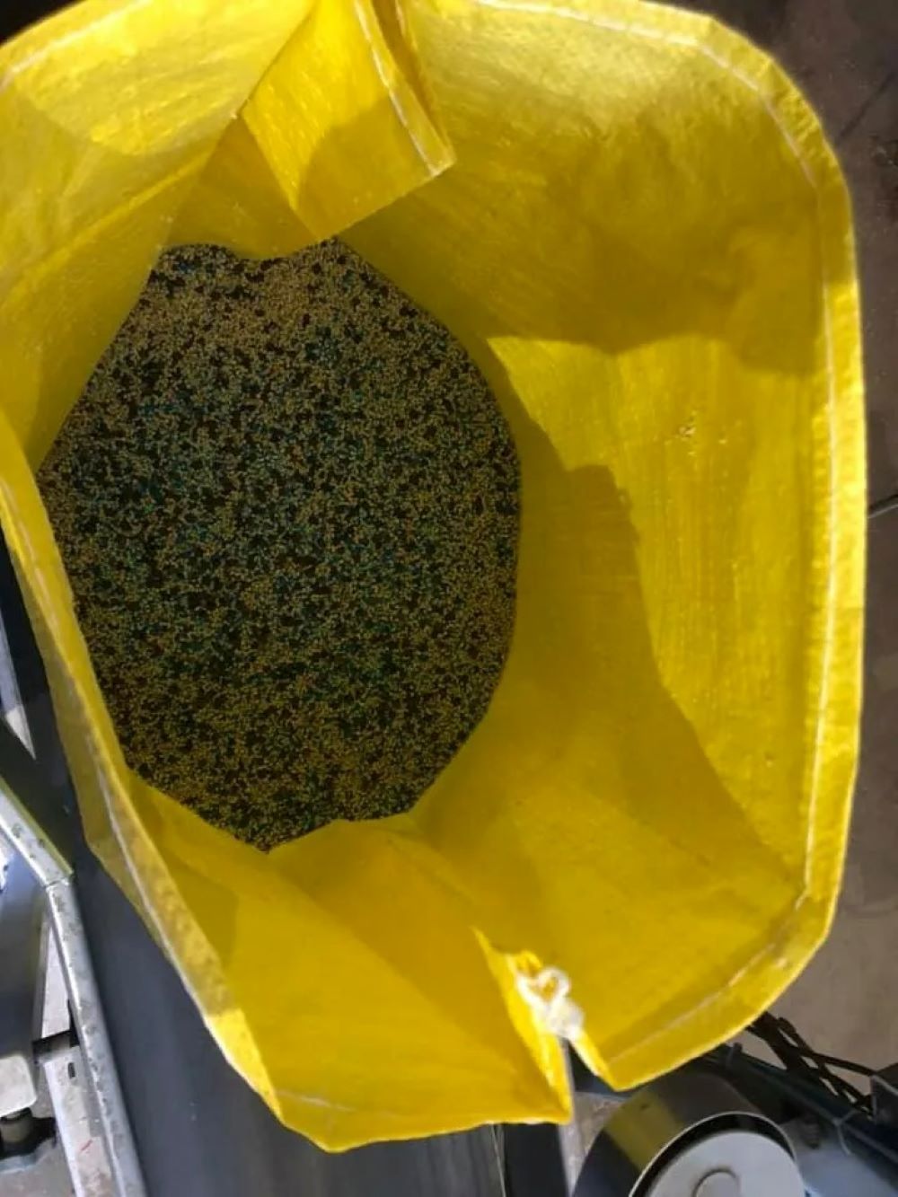 A Yellow Bag Filled With Grains — Wallamore Grain & Produce In Wallamore, NSW