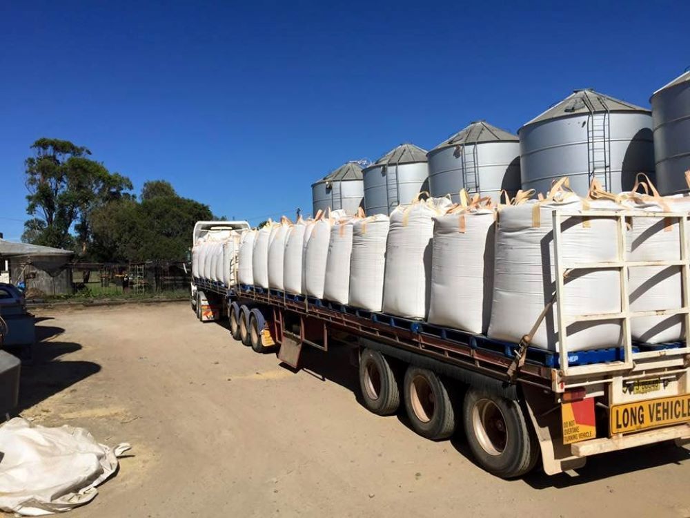 A Truck With a Lot of Bags on the Back of It — Wallamore Grain & Produce In Wallamore, NSW