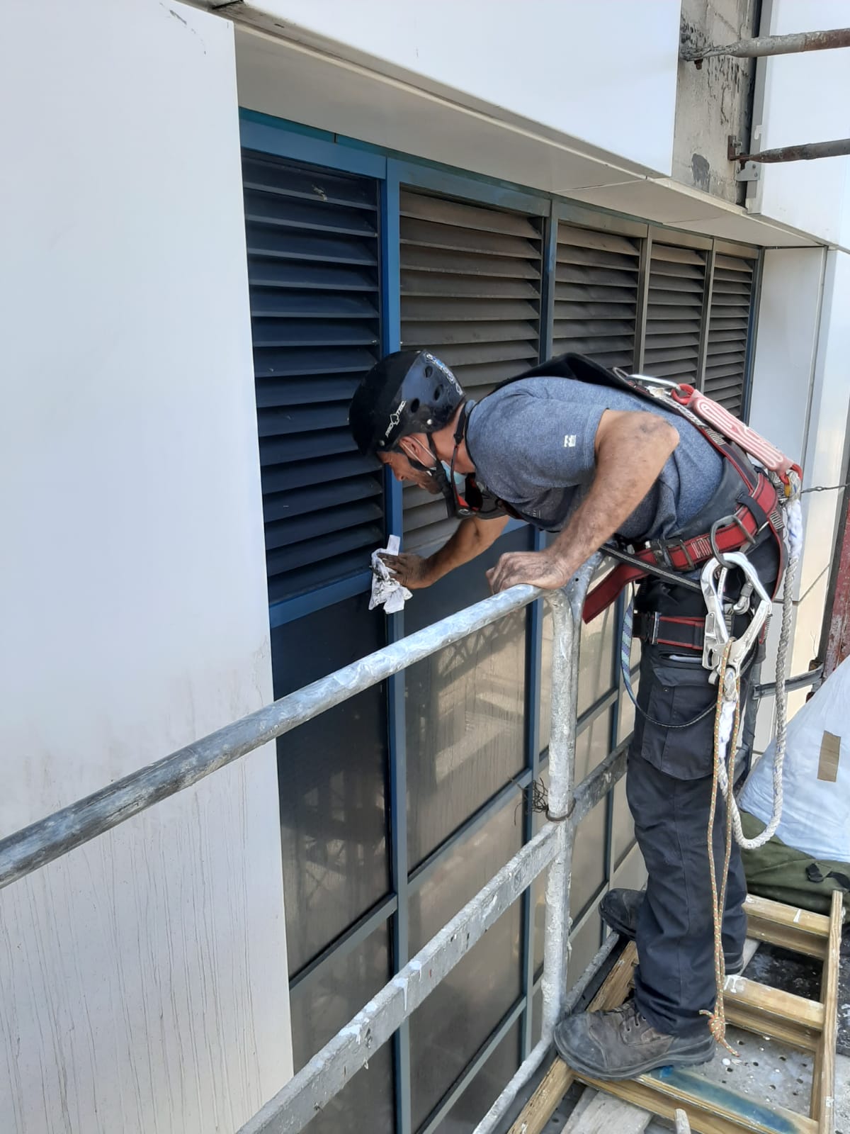 cleaning windows at height