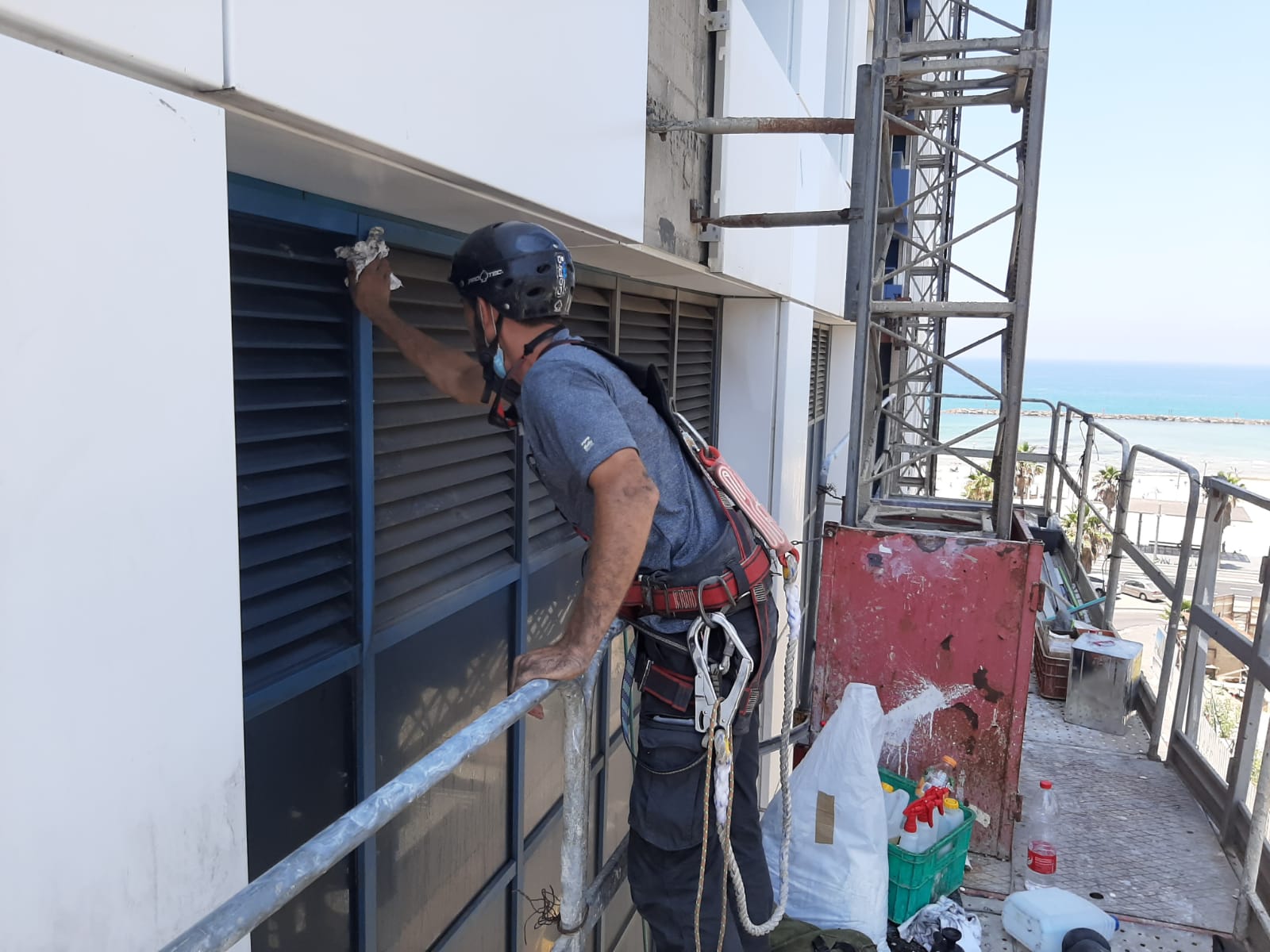 cleaning windows at height
