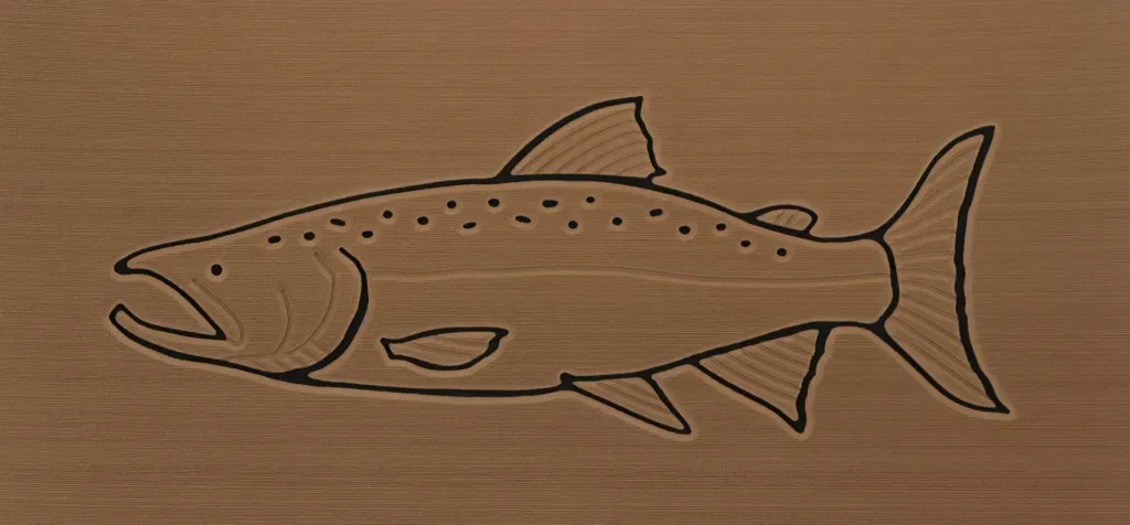 Carved wooden salmon with open mouth and spots.