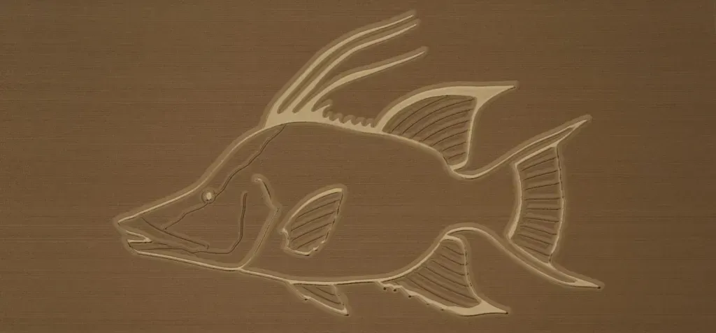 A stylized fish silhouette in light brown carved into a darker brown surface.