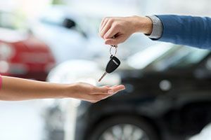persongivingcarkeys