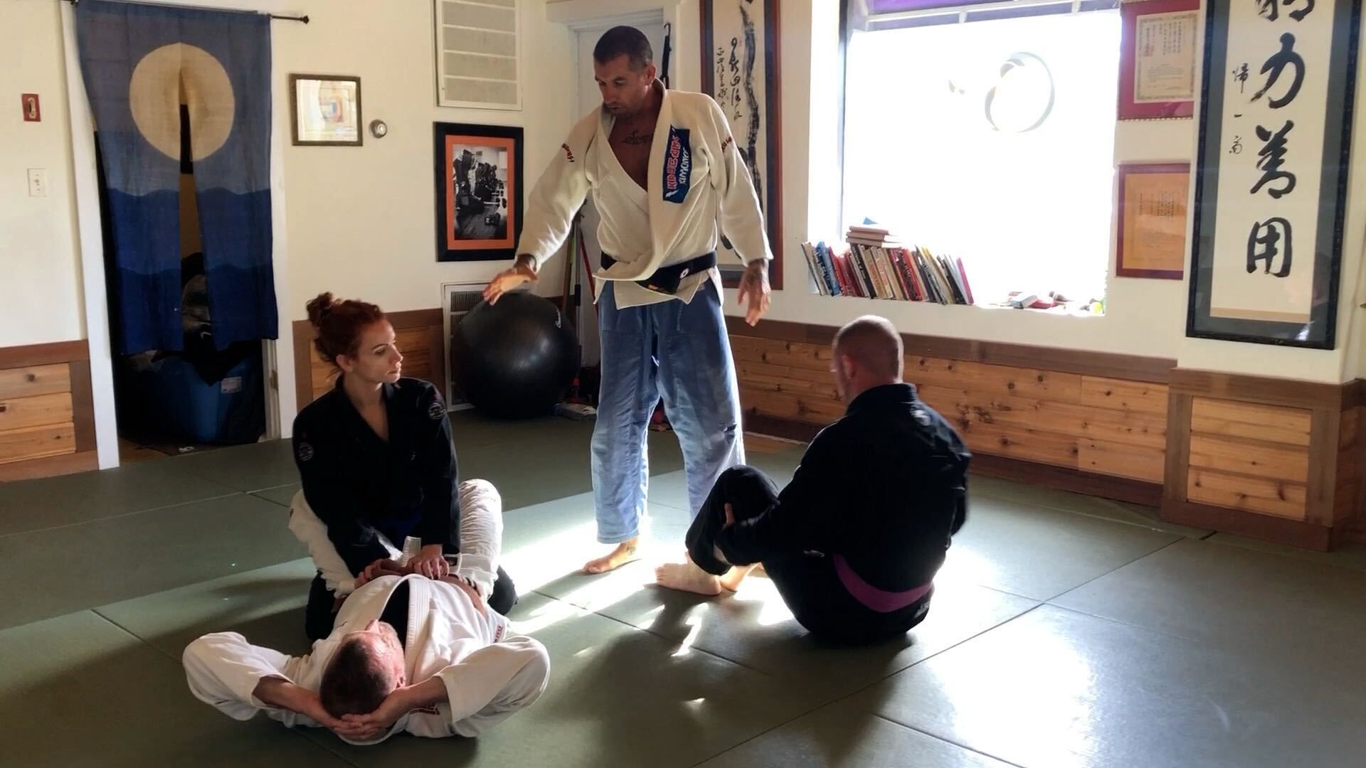 Students drilling Brazilian Jiu-Jitsu techniques at OM Brazilian Jiu-Jitsu & Judo in Northport, NY for stress relief
