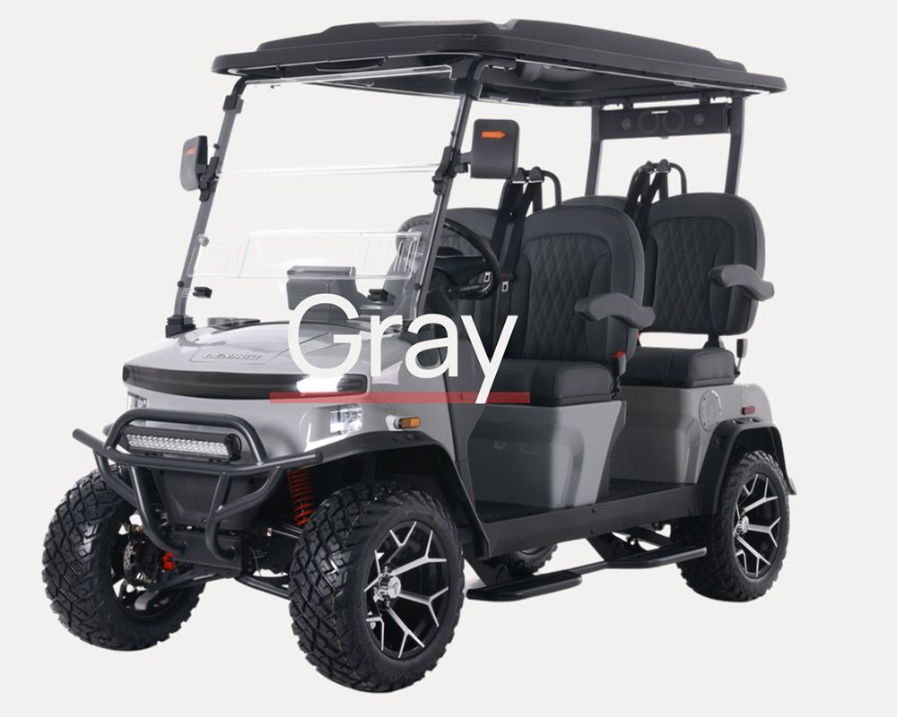 A black golf cart is driving down a city street.