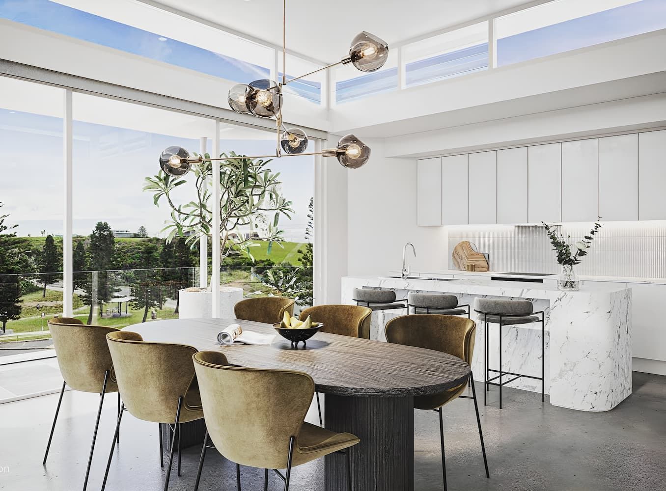 A Dining Room With A Table And Chairs And A Kitchen — DeBu Studios In Albion Park, NSW