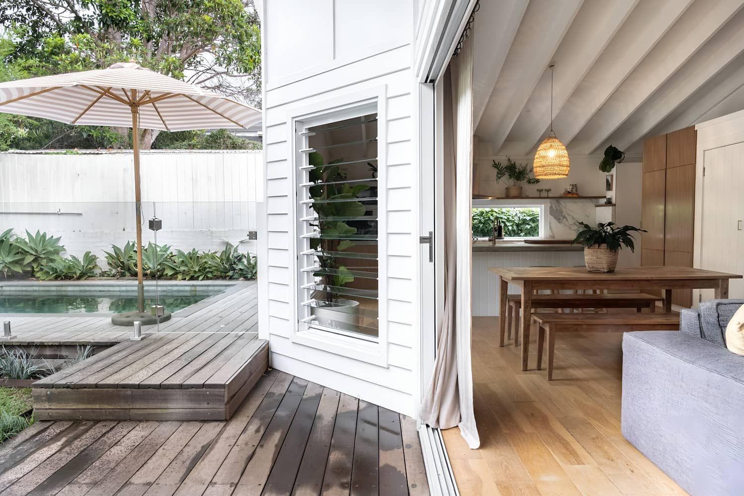 A House With A Wooden Deck And A Swimming Pool — DeBu Studios In Russell Vale, NSW