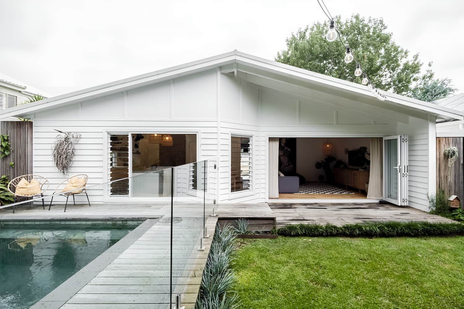 A White House With A Swimming Pool In The Backyard — DeBu Studios In Russell Vale, NSW