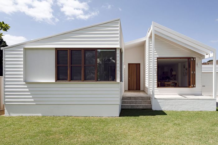 A large house with a white fence in front of it — DeBu Studios In Southern Sydney, NSW