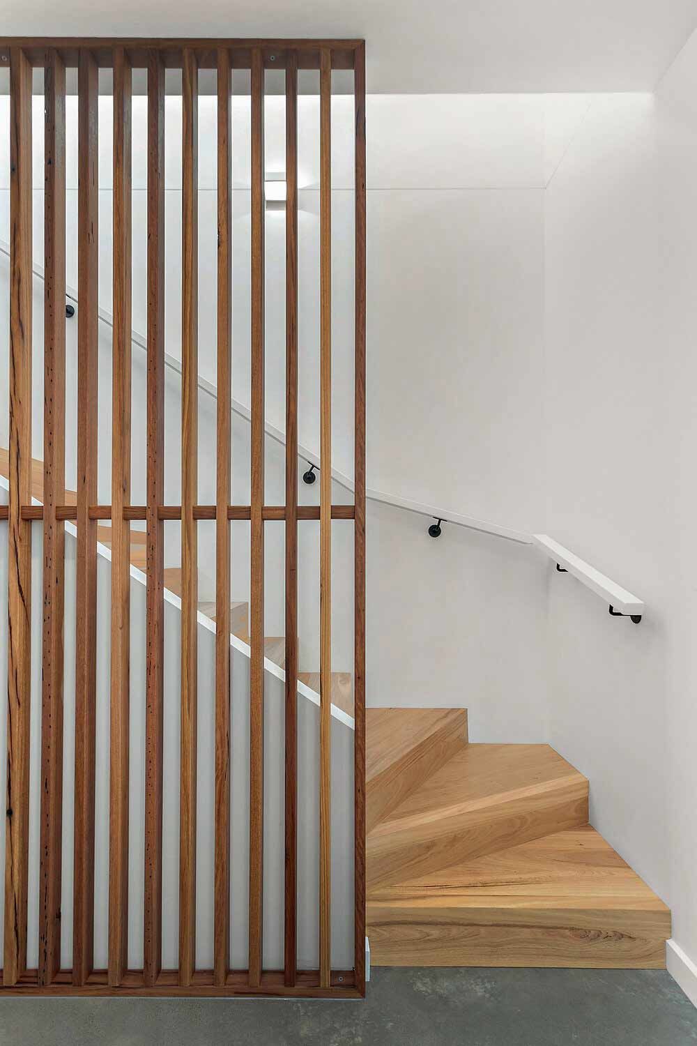 A Wooden Staircase With a Wooden Divider Between the Stairs — DeBu Studios In Russell Vale, NSW