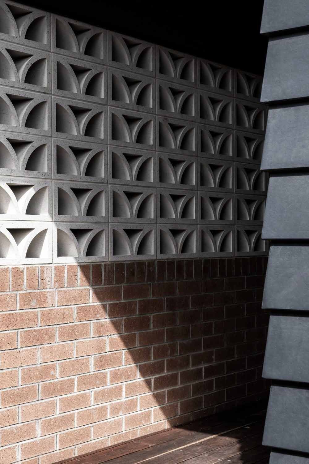 A Brick Wall With a Geometric Pattern on It — DeBu Studios In Russell Vale, NSW