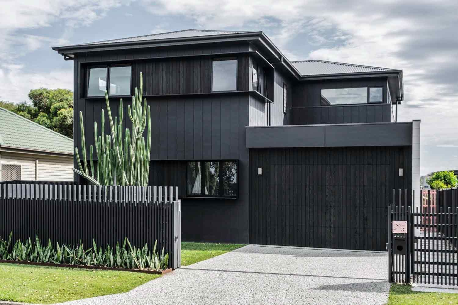 A Black House With a Black Garage Door and a Black Fence — DeBu Studios In Russell Vale, NSW