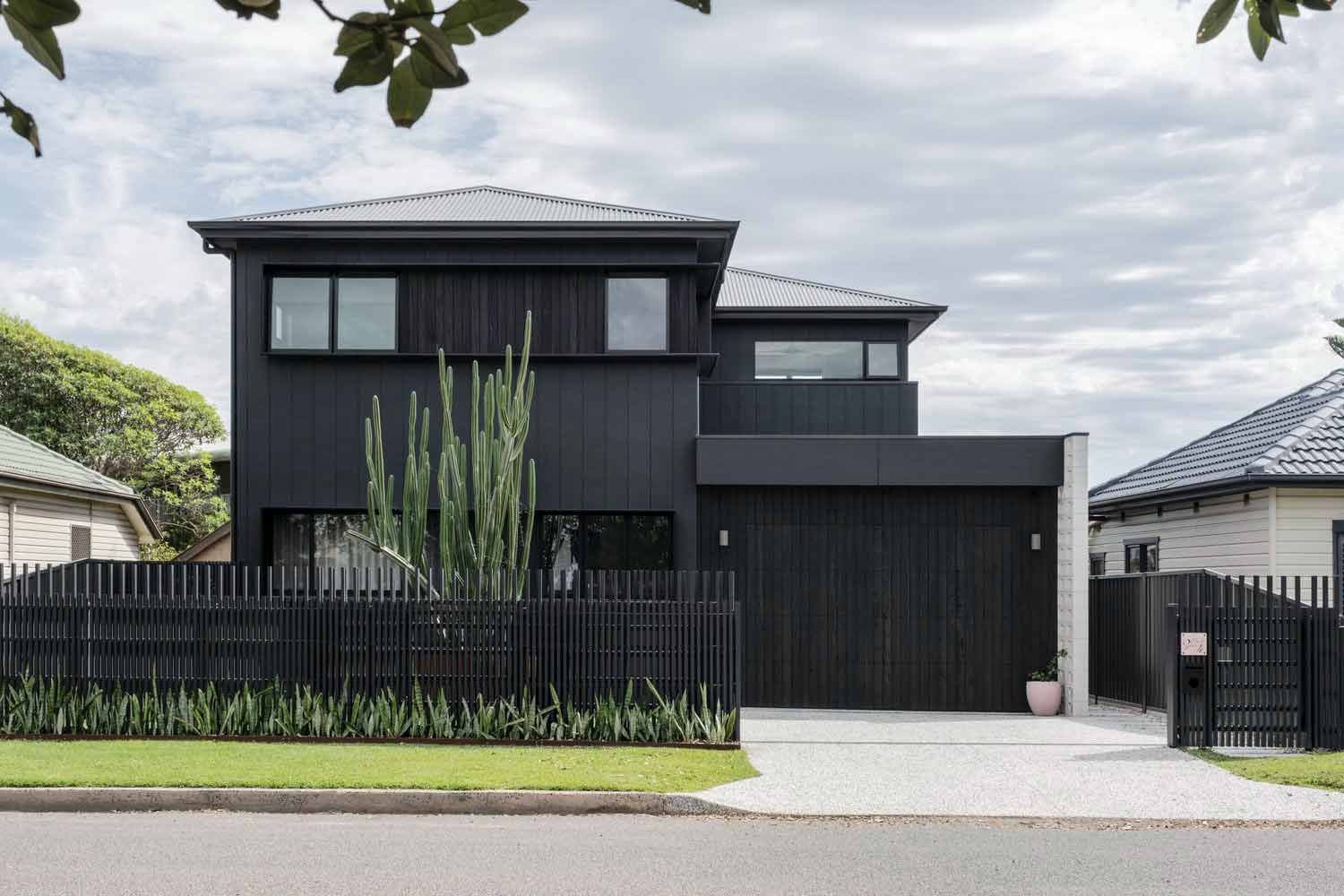 A Black House With a Black Fence in Front of It — DeBu Studios In Russell Vale, NSW