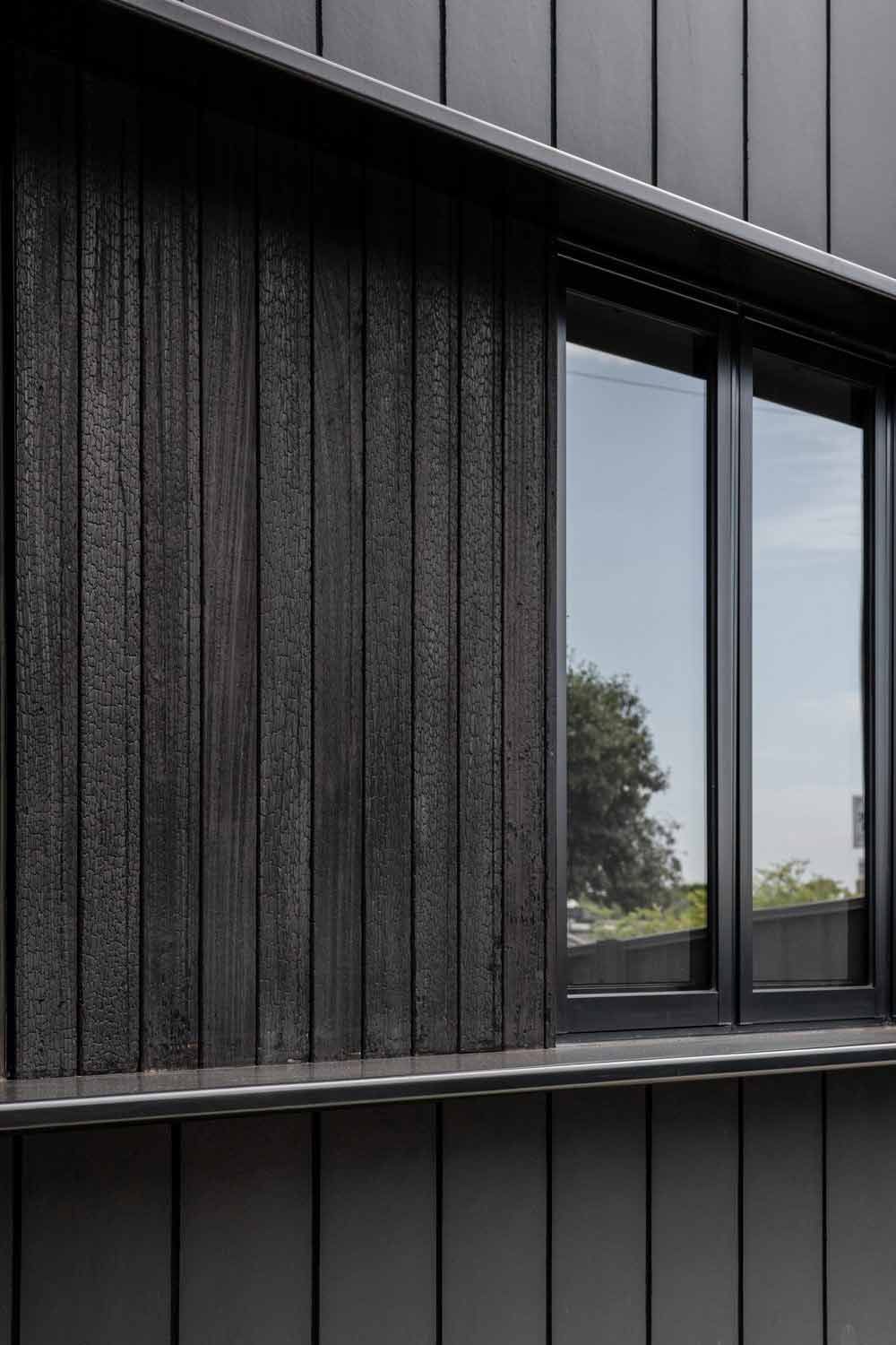 A Close Up of a Window on a Black Building — DeBu Studios In Russell Vale, NSW