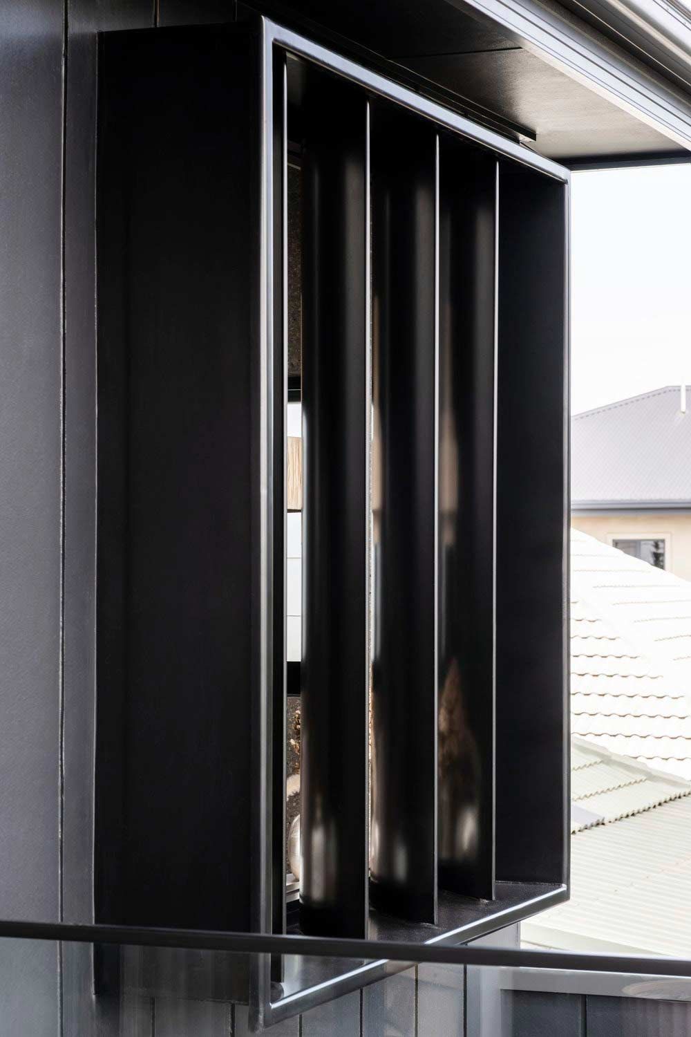 A Window With a Black Frame on the Side of a Building — DeBu Studios In Russell Vale, NSW