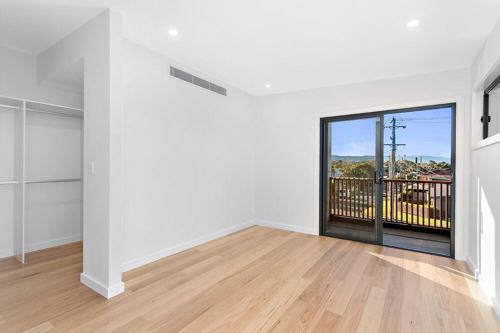 An Empty Room With Hardwood Floors — DeBu Studios In Russell Vale, NSW