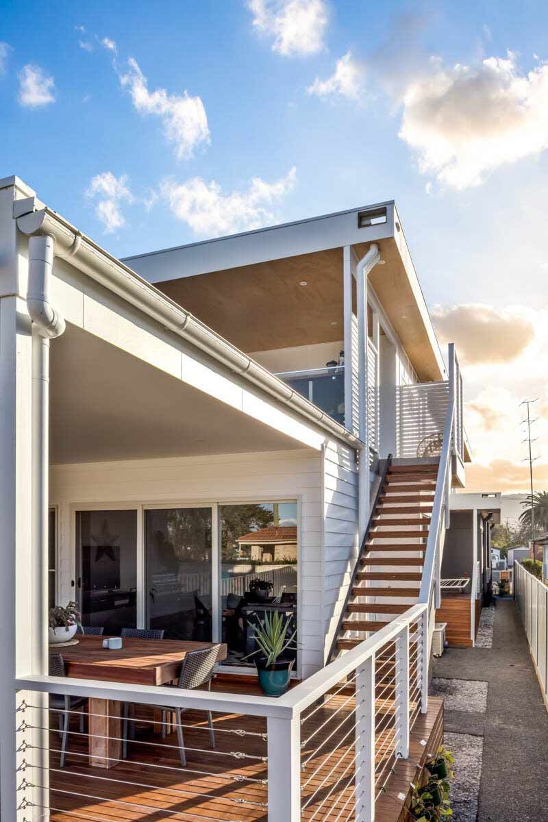 A House With a Balcony and Stairs Leading Up to It — DeBu Studios In Russell Vale, NSW