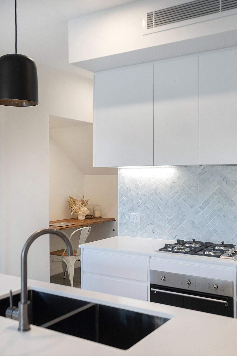 A Kitchen With White Cabinets — DeBu Studios In Russell Vale, NSW