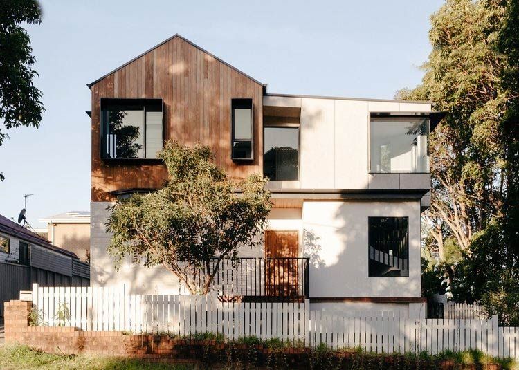 A White House With a Wooden Roof and a White Picket Fence — DeBu Studios In Russell Vale, NSW