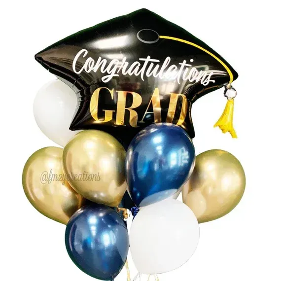 Black graduation cap balloon with “Congratulations GRAD” above gold, blue, and white balloons