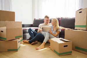 Couple In The Middle Of The Boxes — Clarksville, AR — Phil Taylor Insurance Agency, Inc. Couple In The Middle Of The Boxes — Clarksville, AR — Phil Taylor Insurance Agency, Inc.