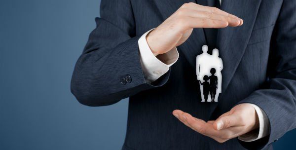 A Man Covering Image Of A Family — Clarksville, AR — Phil Taylor Insurance Agency, Inc. A Man Covering Image Of A Family — Clarksville, AR — Phil Taylor Insurance Agency, Inc.