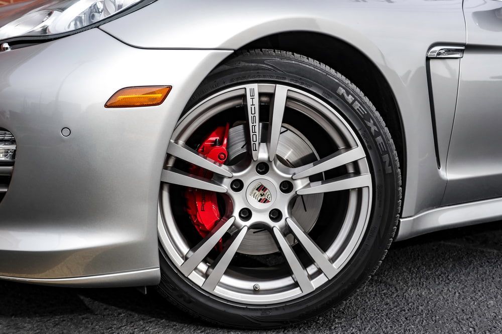 A Close Up Of A Silver Car With Red Brake Pads — Summit Smash In Polo Flat, NSW