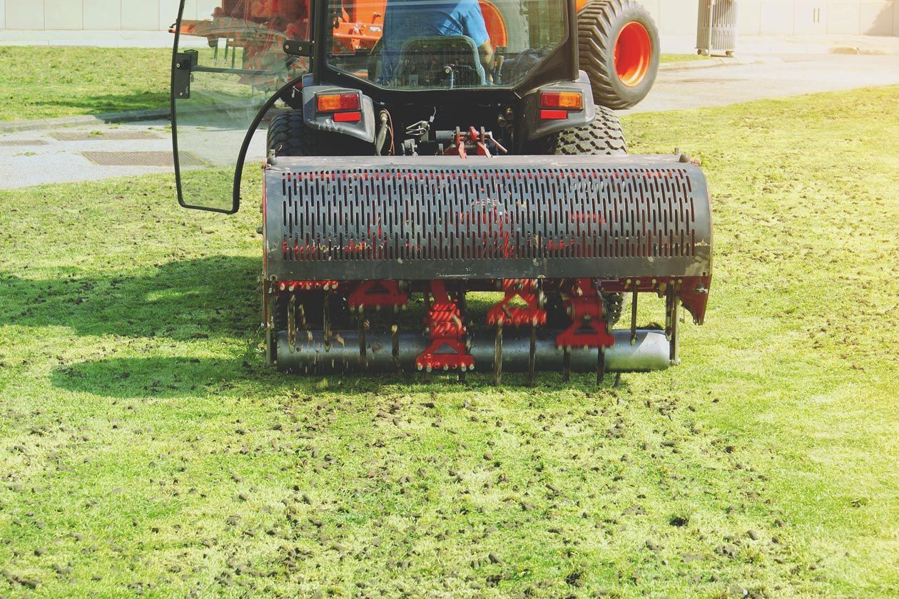 Operating Soil Aeration Machine — Belleville, IL — WD Lawn Care
