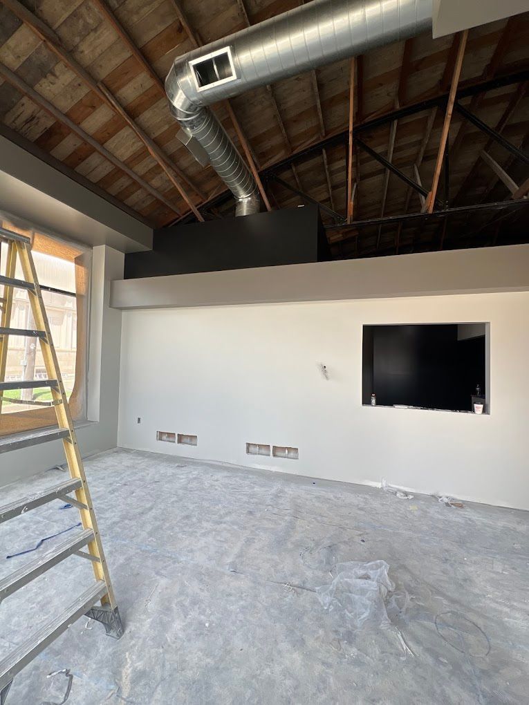 There is a ladder in the middle of the room.
