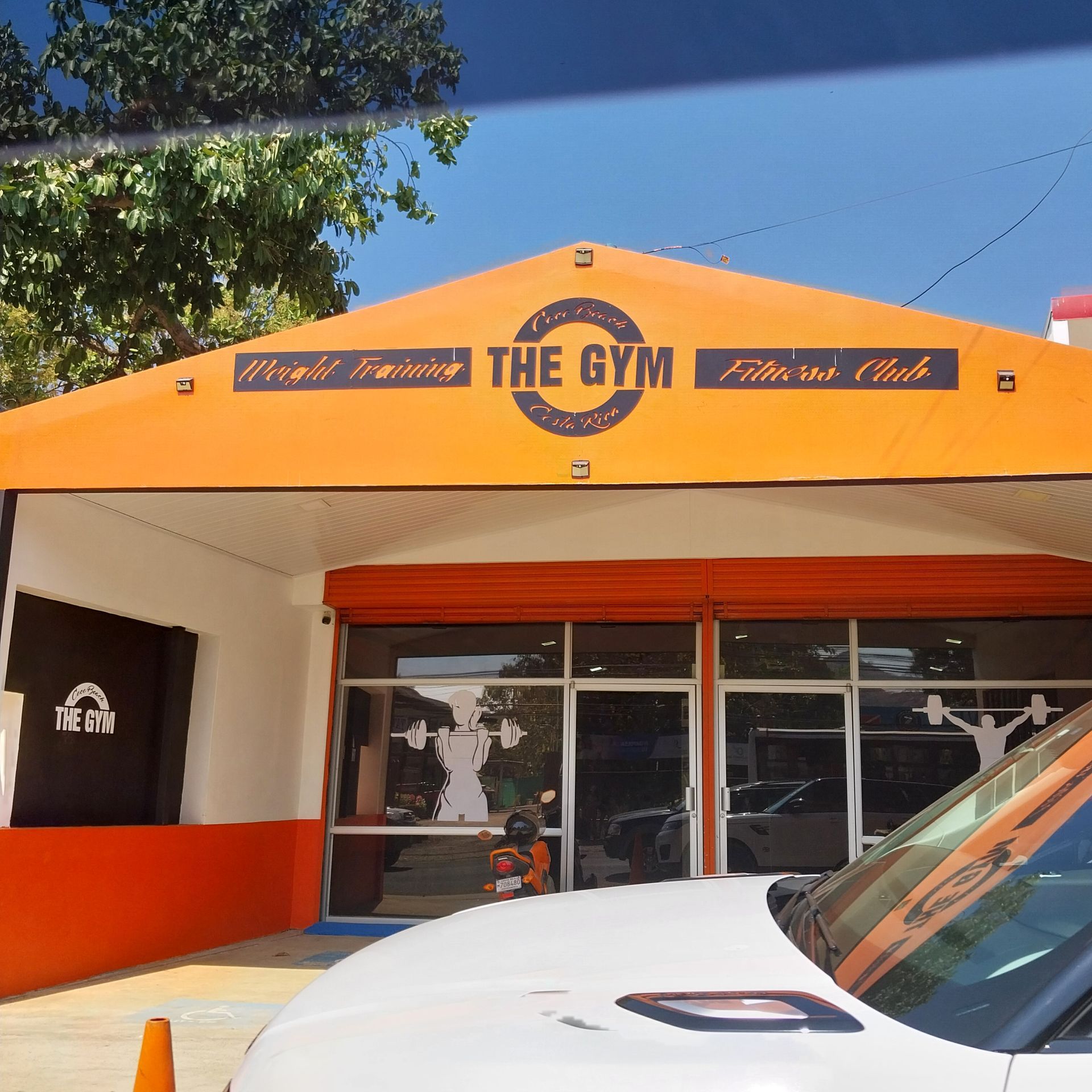 Orange and white gym exterior with 