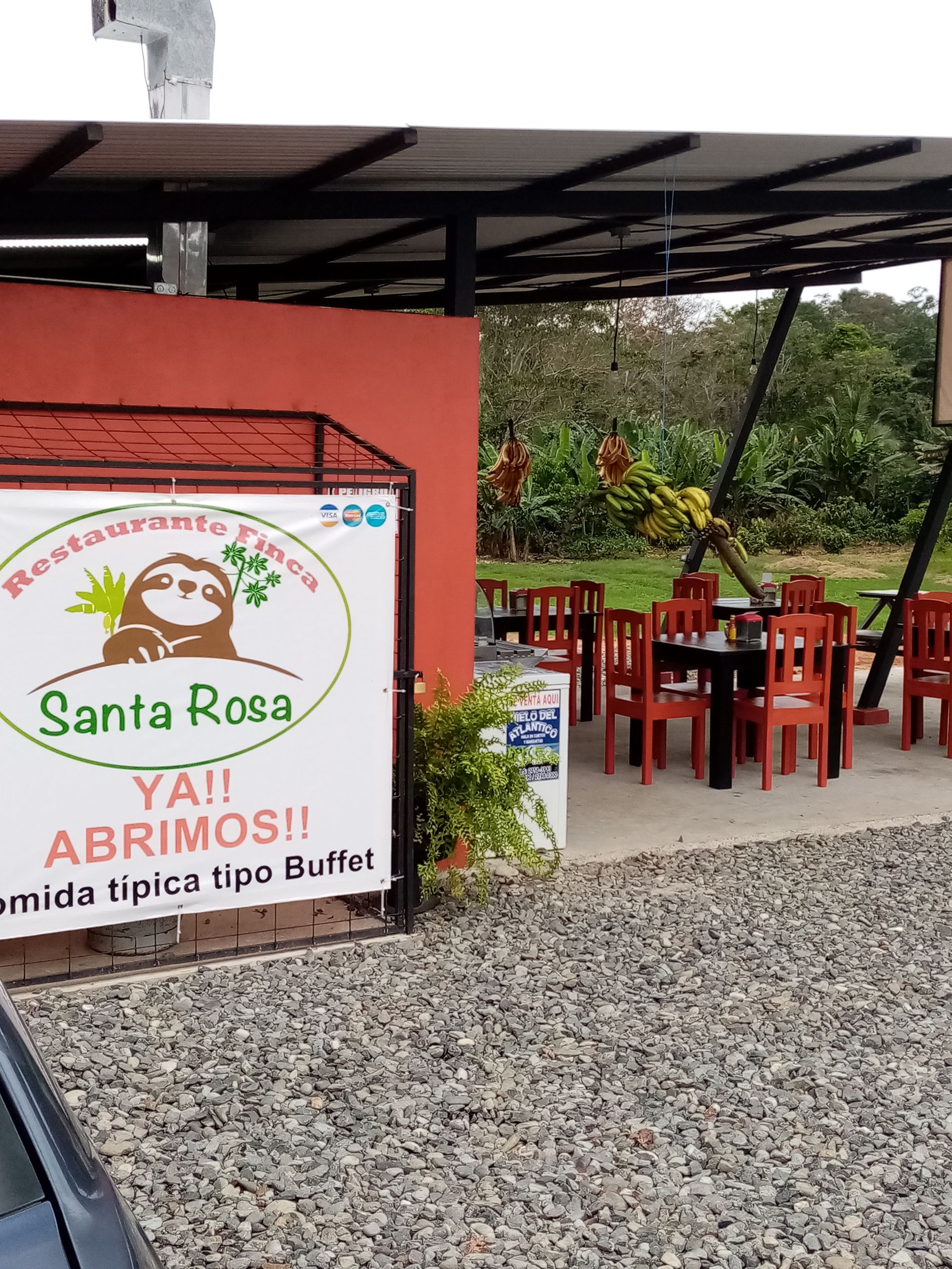 Restaurant Santa Rosa with outdoor seating, sign says 