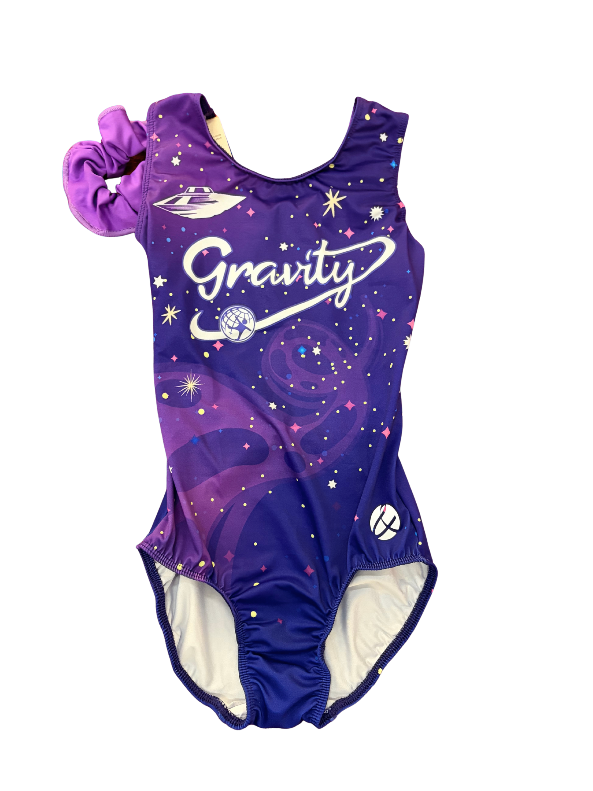 Purple toddler leotard with “Gravity” text, stars, and attached tutu on a white background
