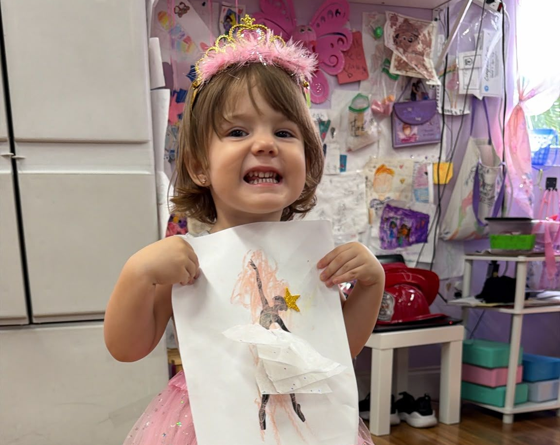 Young child enjoying a play-based learning activity during Mornings of Discovery at Gravity