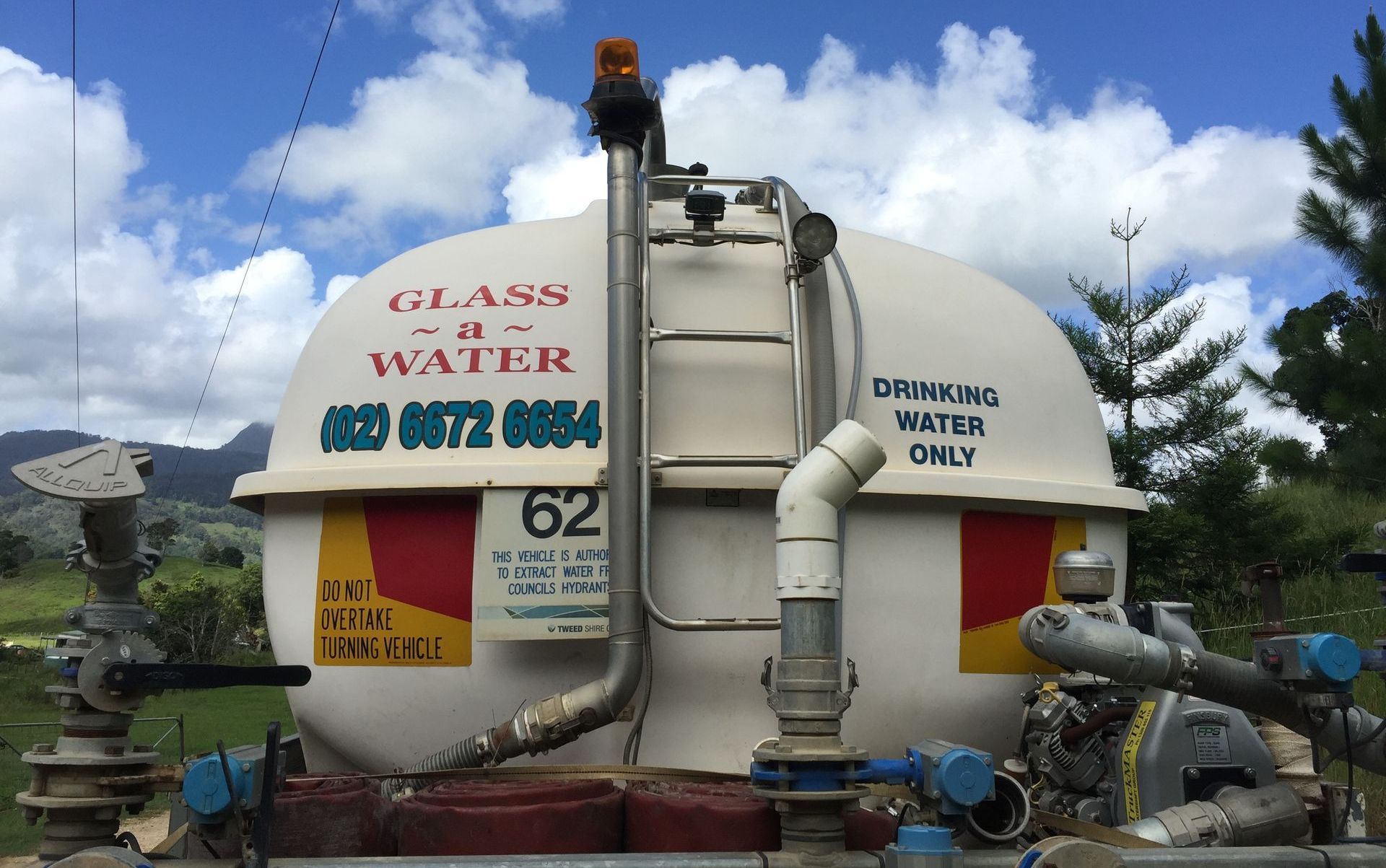 A white tank with the number 62 on it