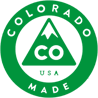 Green circular Colorado Made logo with “CO” and mountain icon in white and green.