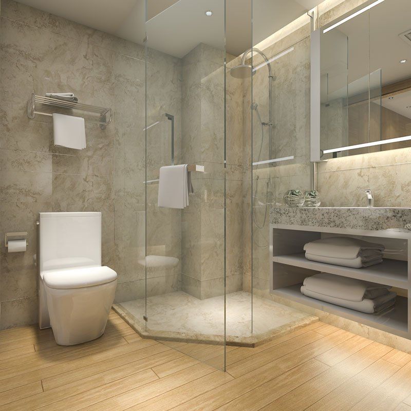 A bathroom with a toilet , sink , and walk in shower.