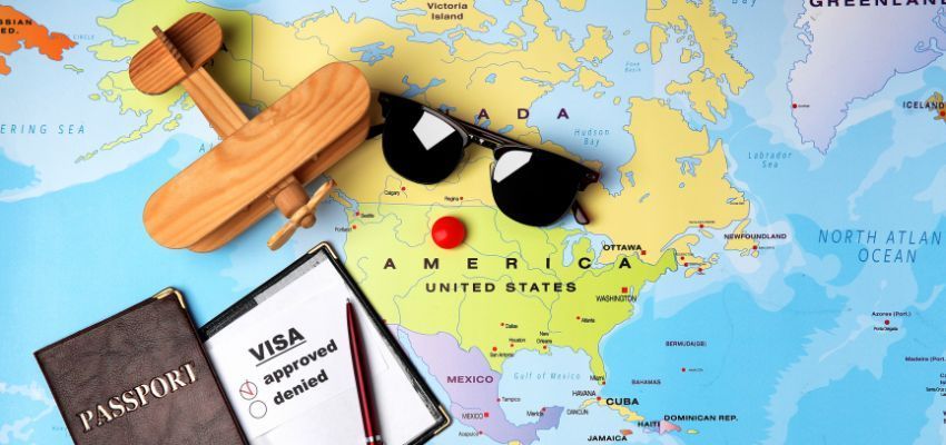 A passport and visa of a Canadian person living abroad.